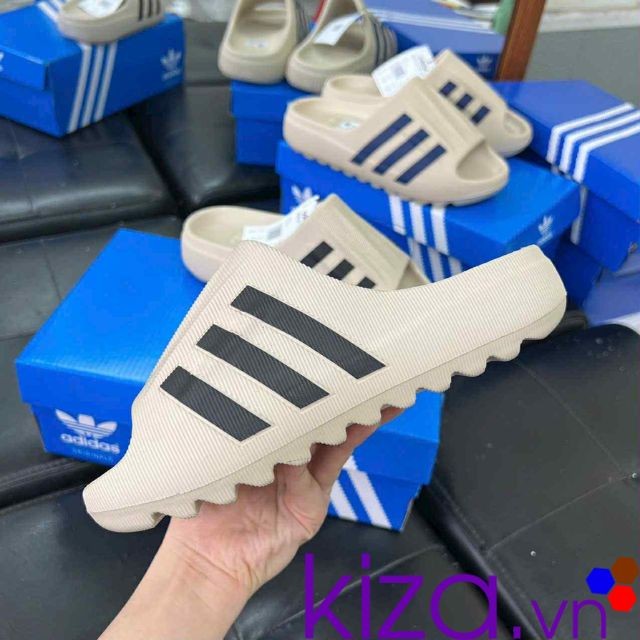 Dép Adidas màu kem 3 sọc đen