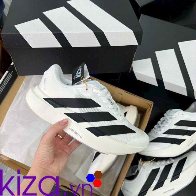 Giày chạy bộ Adidas Adizero màu trắng sọc đen