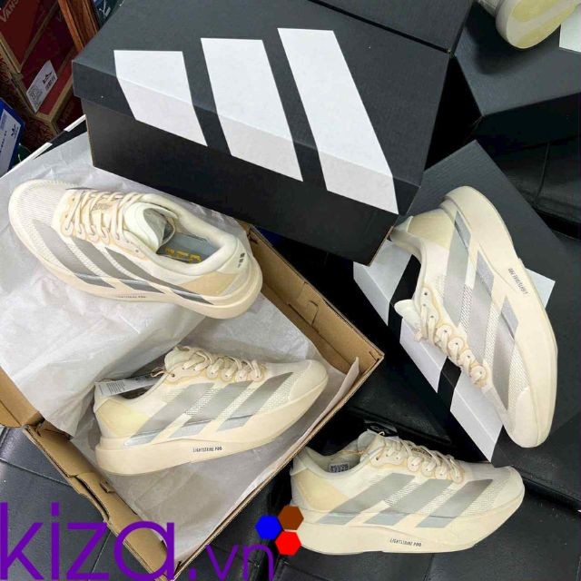 Giày chạy bộ Adidas Adizero màu vàng kem
