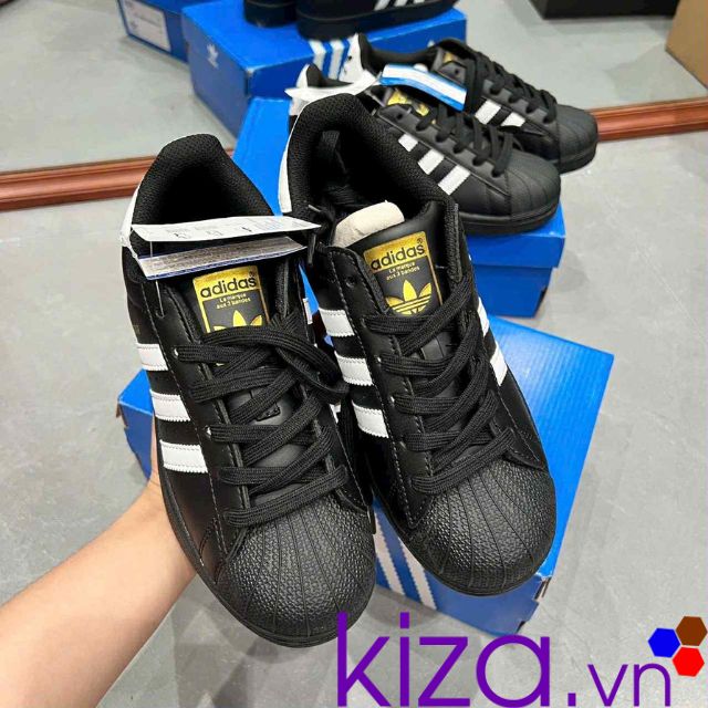 Giày Adidas nữ Superstar mũi sò màu đen tem vàng